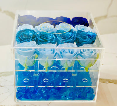 Modern Rose Box with preserved roses that last for years with an ombre design of light blue roses, tiffany blue roses, metallic blue roses and royal blue roses
