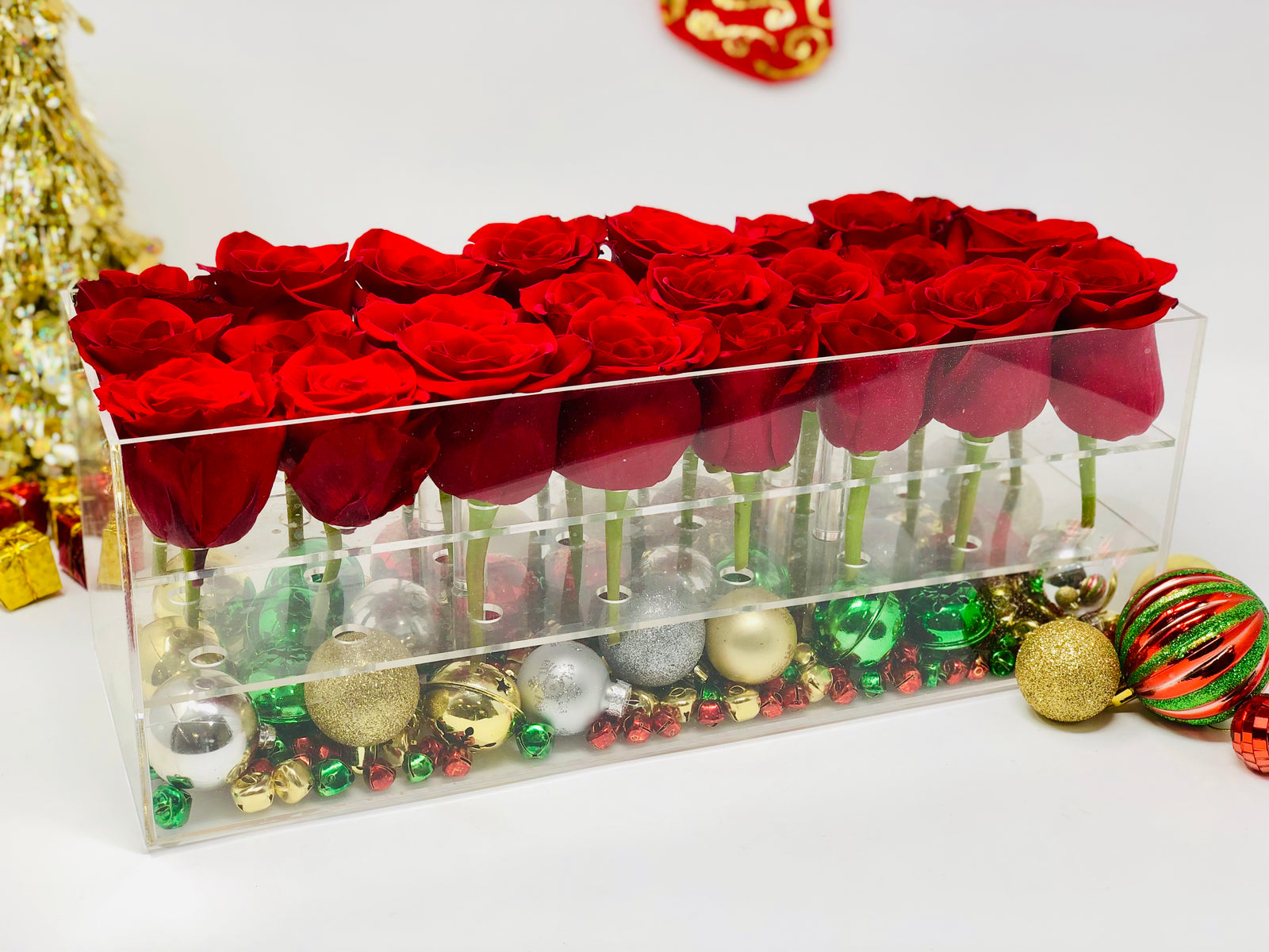 Clear Modern Rose Box with Forever Roses that last for years in a classic red and decorated for the Christmas holiday