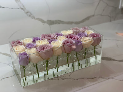 Modern rose box containing two dozen preserved long lasting roses in ivory roses and lavender roses