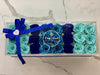 Modern rose box containing two dozen preserved long lasting roses in blue roses, navy blue roses and metallic blue roses